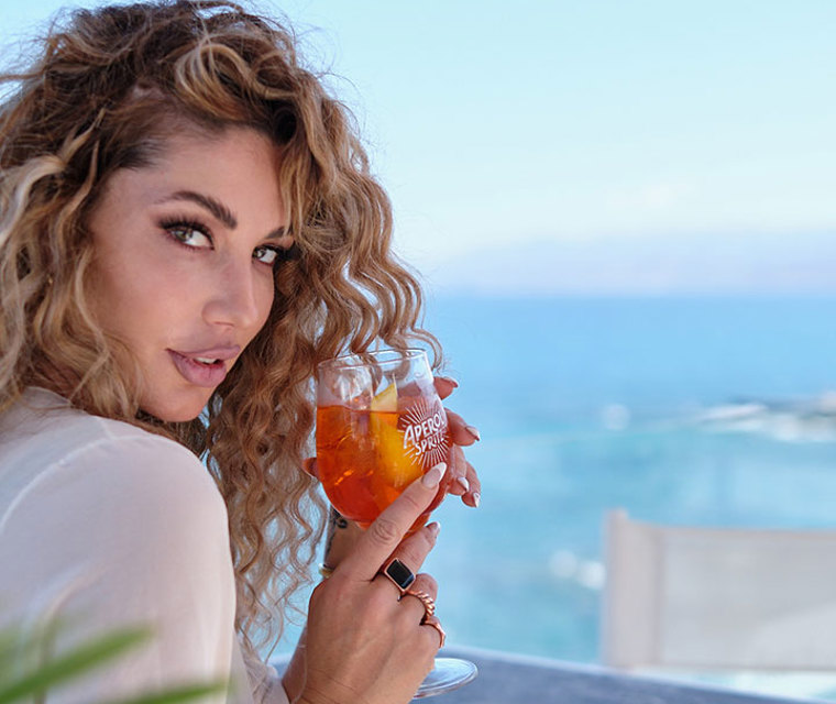 Cretan Blue Beach Hotel visitor holding a drink